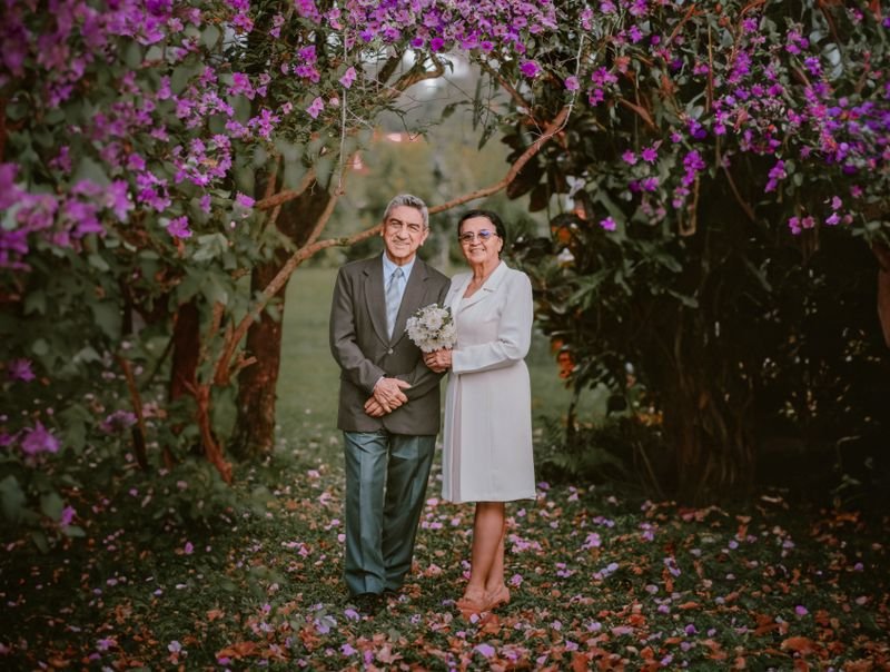 Happy senior couple ready to download and start dating safely online
